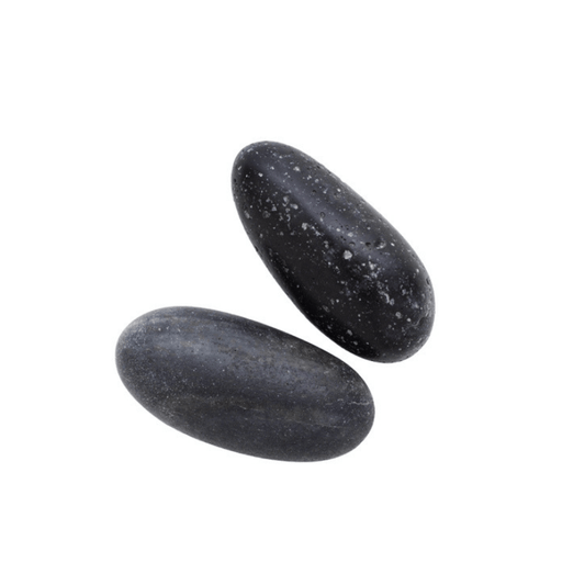 Basalt trigger point stones. Two rounded black stones on a white background.